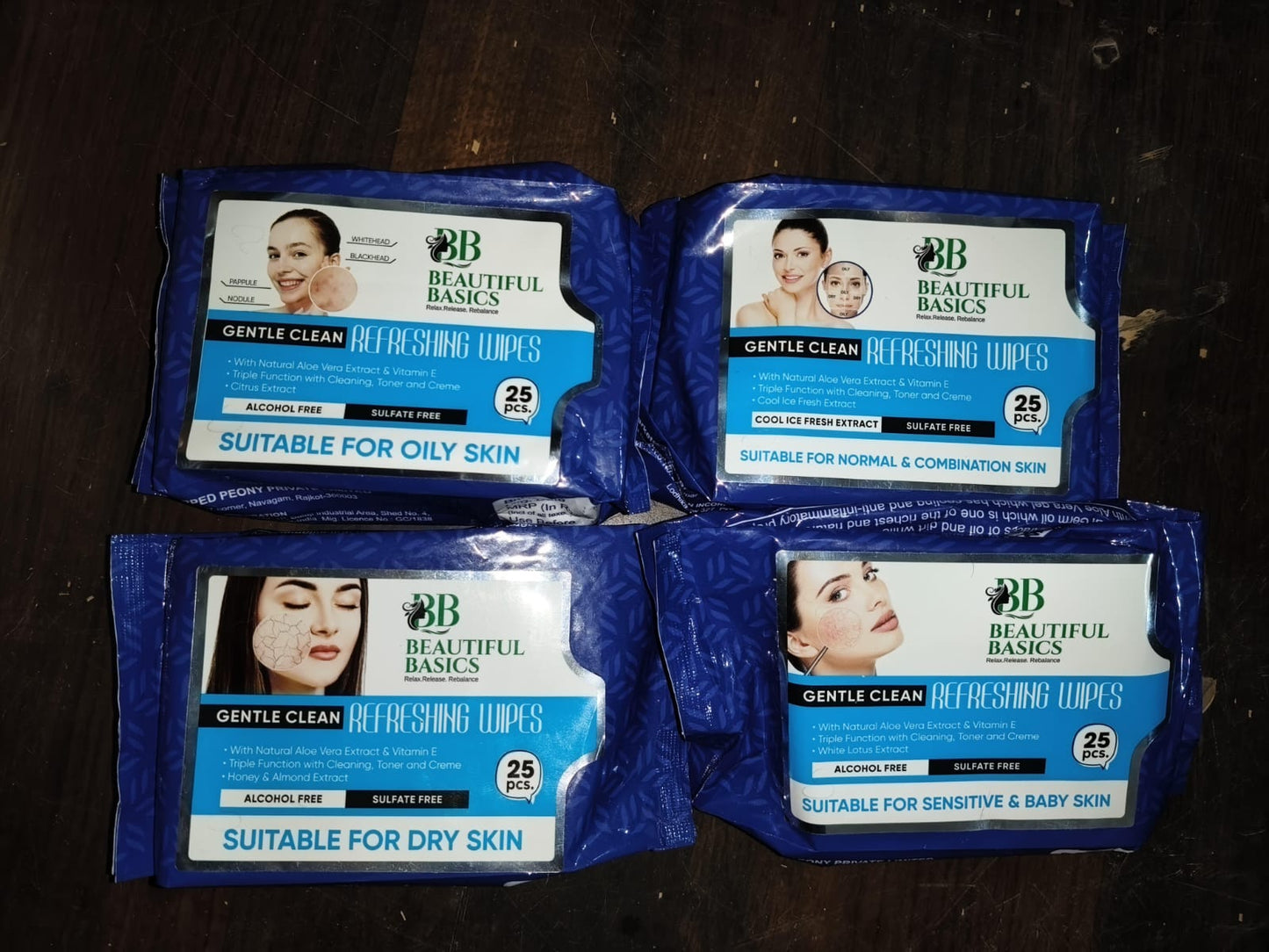 Beautiful Basics 4 blue packs of gentle cleansing wipes labeled for oily dry normal sensitive skin face wipes for all skin types