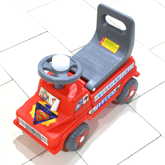 red plastic kids ride on push car with backrest and steering wheel with alphabet stickers