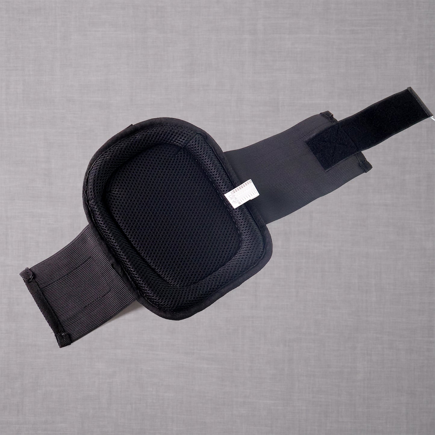 black cushioned shock-resistant knee pads for construction with adjustable strap and breathable mesh