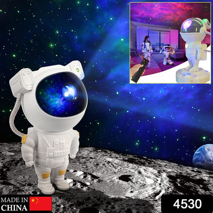 astronaut projector casting colorful nebula and starfield on ceiling galaxy projector night lamp for kids