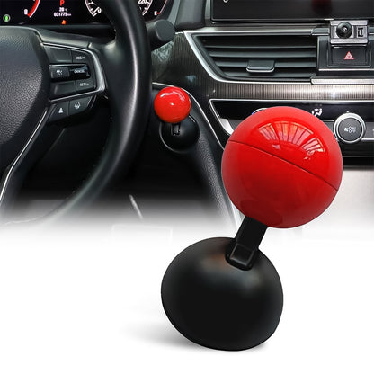 red glossy spherical universal car start button accessory mounted on dashboard near steering wheel for easy push start