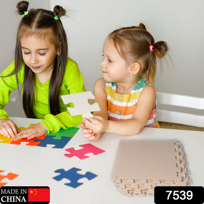 soft puzzle mats for babies crawling shown as colorful foam puzzle pieces assembled by two young girls