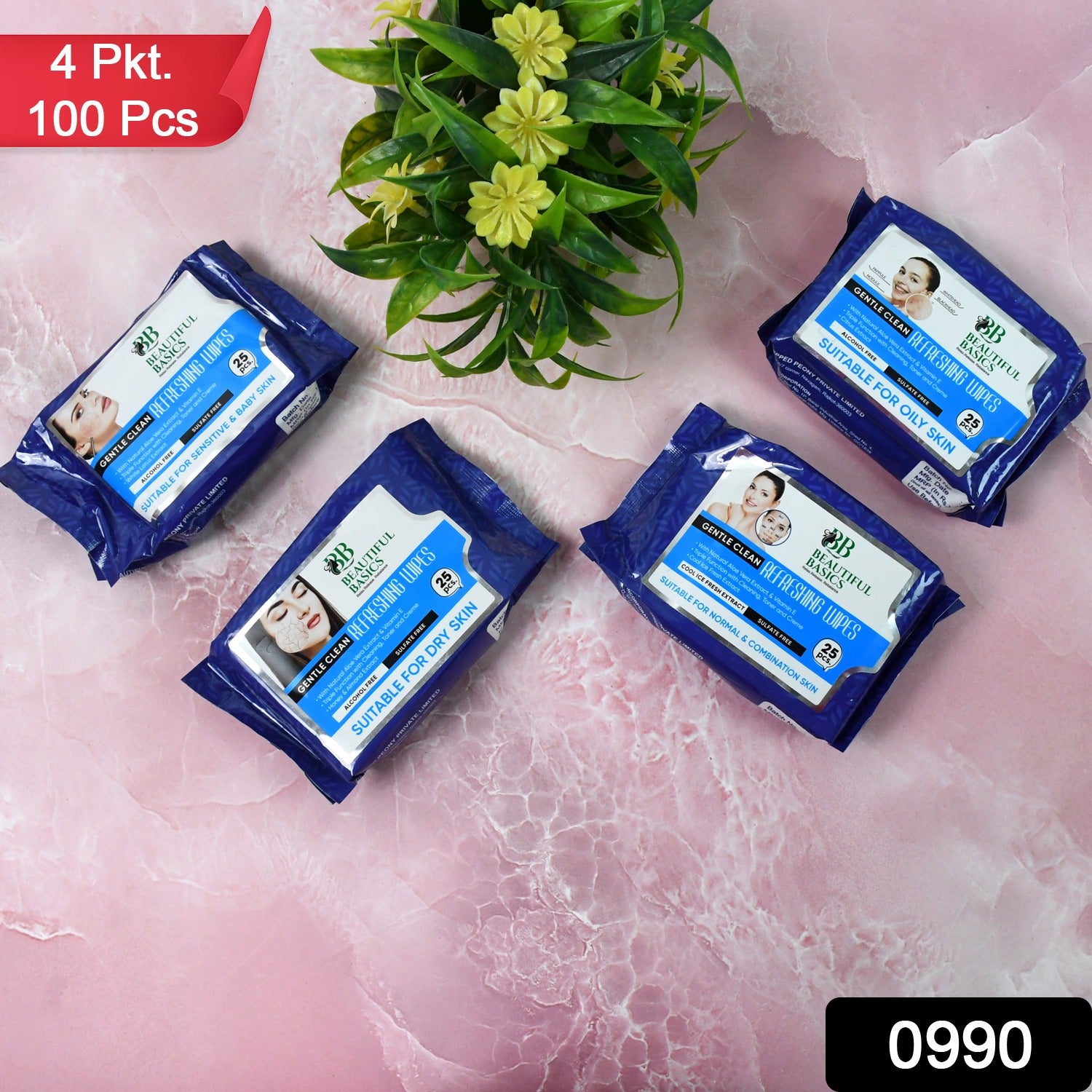 4 pack 100 pcs blue packages of face wipes for all skin types on pink marble background