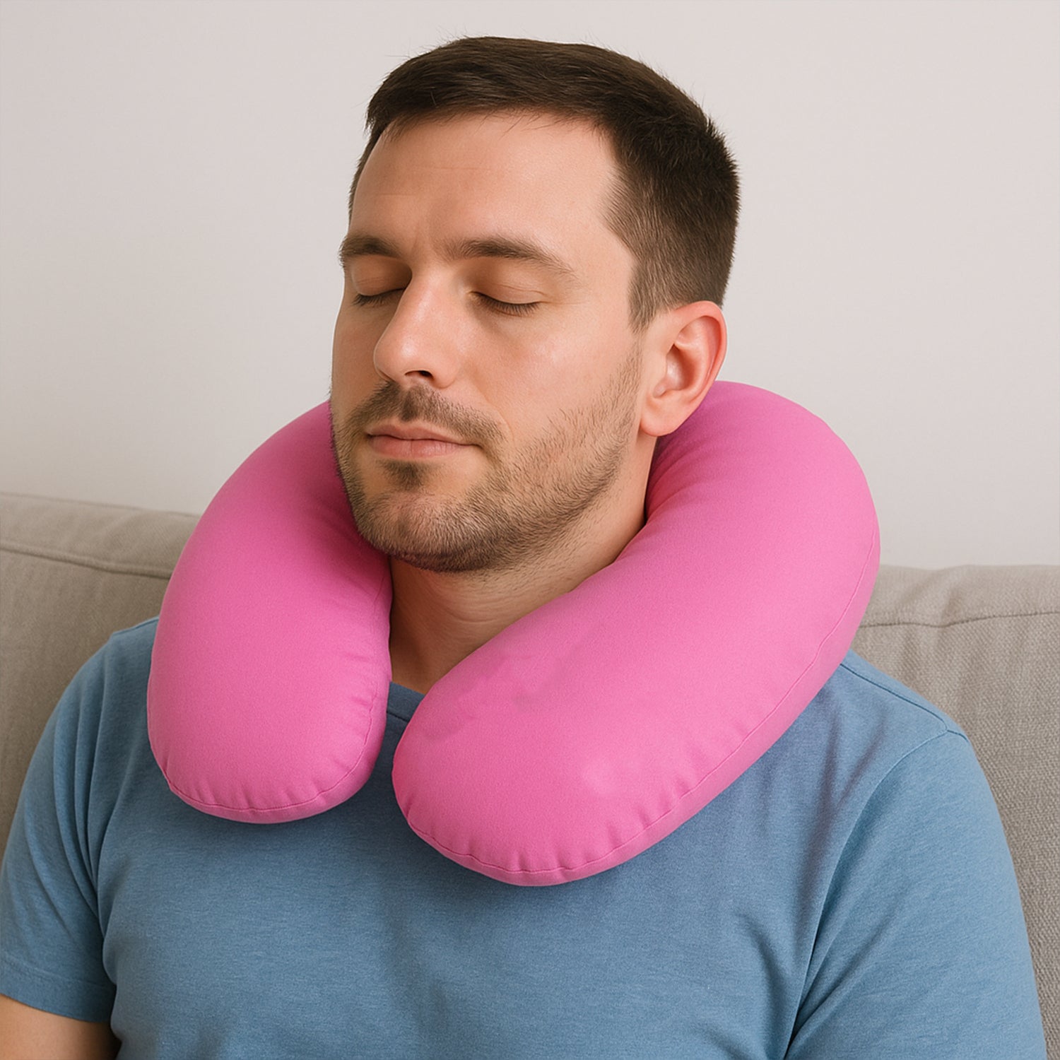pink U shaped travel neck pillow for airplanes providing soft support for sleeping