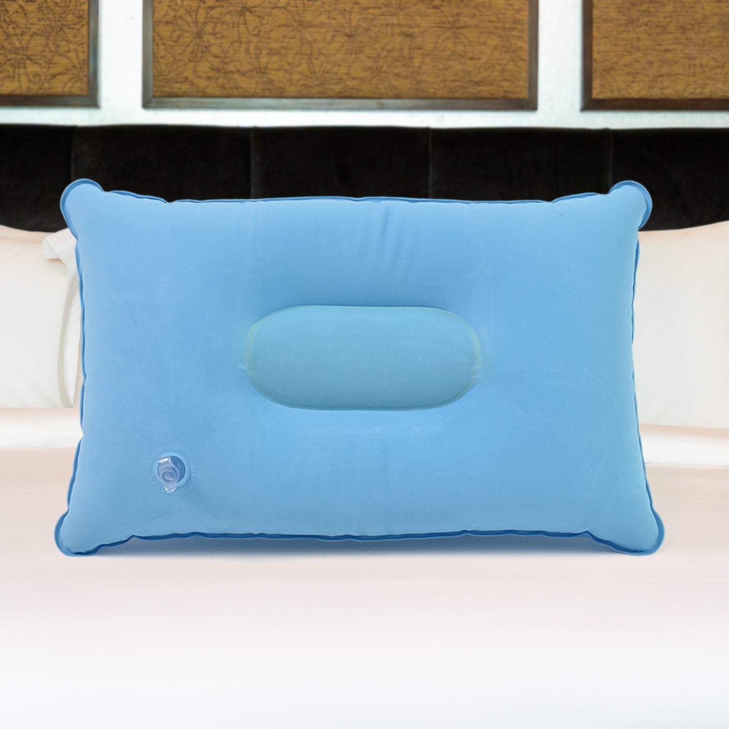blue compact inflatable pillow for camping with center head cradle and air valve for travel