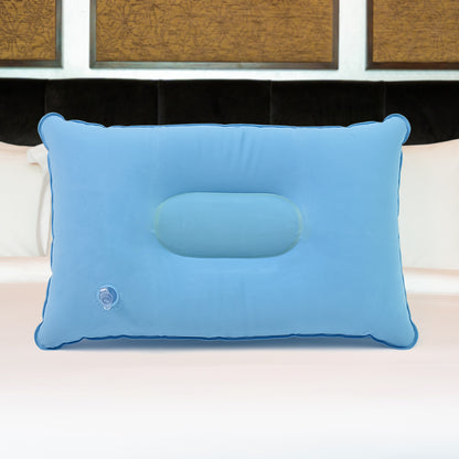 blue compact inflatable pillow for camping with center head cradle and air valve for travel
