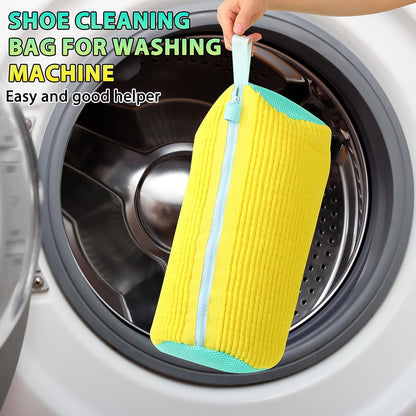 yellow zippered shoe washing bag being placed in washer with microfiber shoe cleaning mop cover