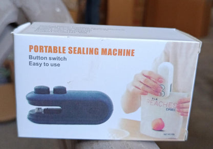portable heat sealer and cutter handheld sealing machine box showing black sealer and hand sealing snack bag