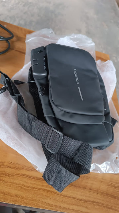 black compact shoulder pouch with adjustable strap and front flap labeled FASHION trendy shoulder bag for travel