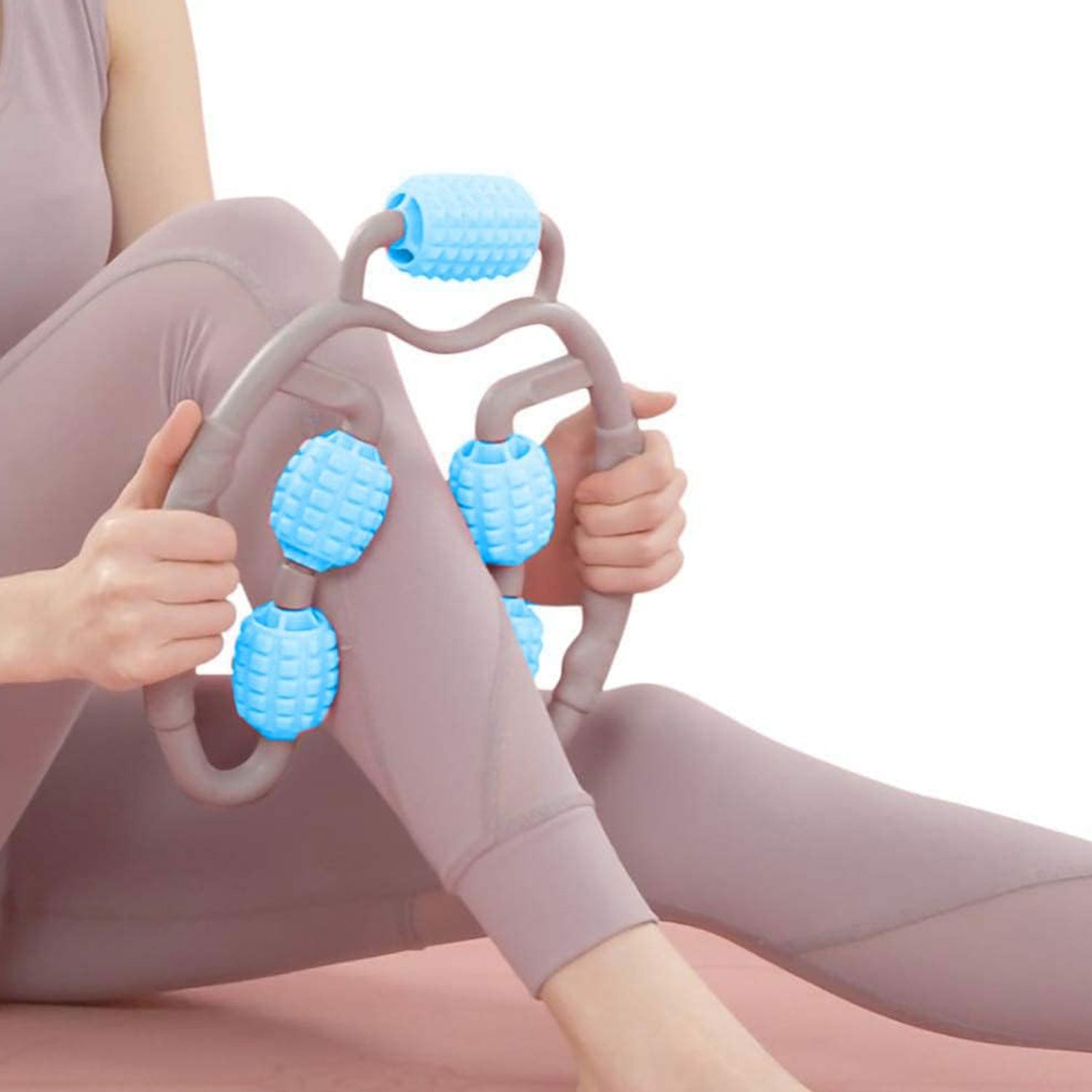 5 wheel fitness roller massager with textured blue rollers used on leg for muscle relief