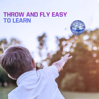 Child playing with a flying orb ball toy outdoors, showing how to throw and fly easily