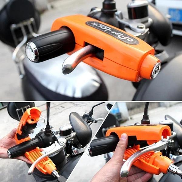 orange anti-theft brake lever lock for bikes mounted on motorcycle handlebar to prevent theft
