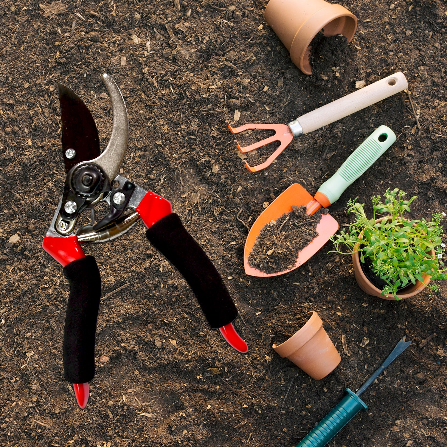 red black pruning shears with trowel hand rake and pots on soil best garden shears for home use