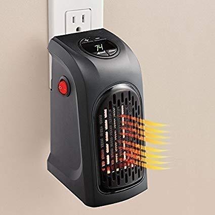 portable handy room heater plug in compact electric heater with digital display and safety grill