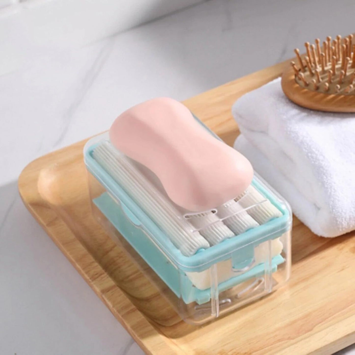 multi-purpose soap dispenser case clear storage box with pink soap and cotton swabs