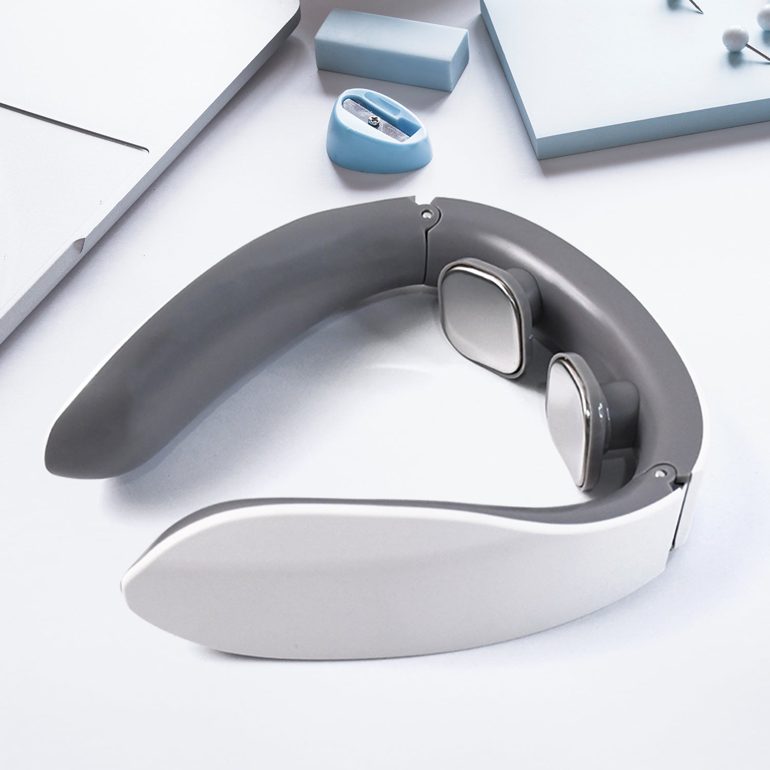 electric neck massager for pain relief white and gray U shaped wearable device with dual metal massage pads