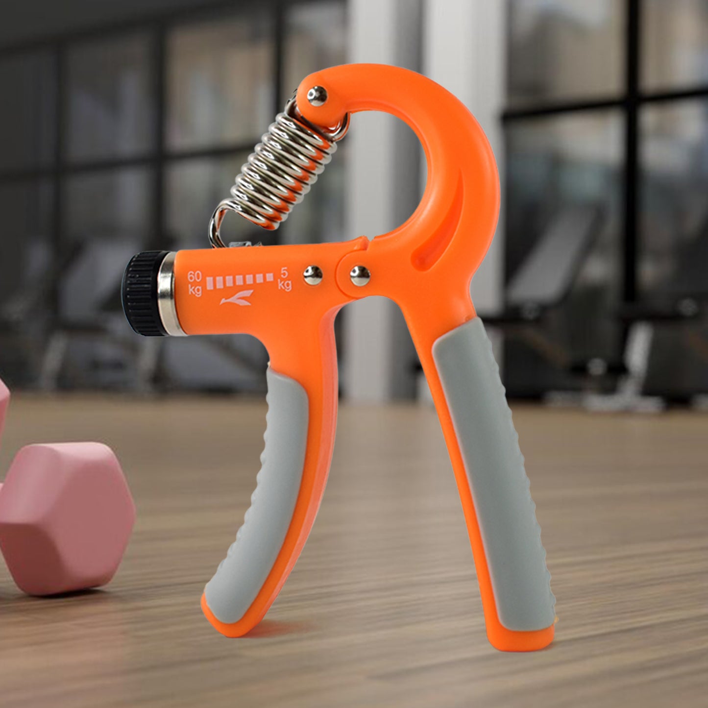 adjustable orange hand gripper with dial 5 to 60 kg and cushioned gray handles best grip strengthener for gym