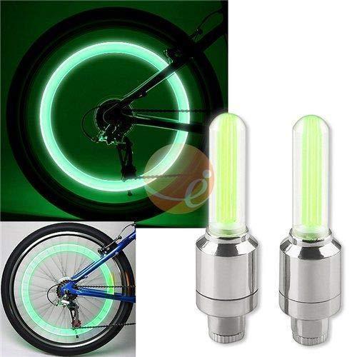 green LED valve cap wheel lights for bicycle rims glowing neon green to enhance nighttime visibility