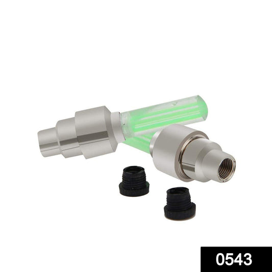 green LED tire valve stem lights with silver aluminum caps and rubber adapters for cars