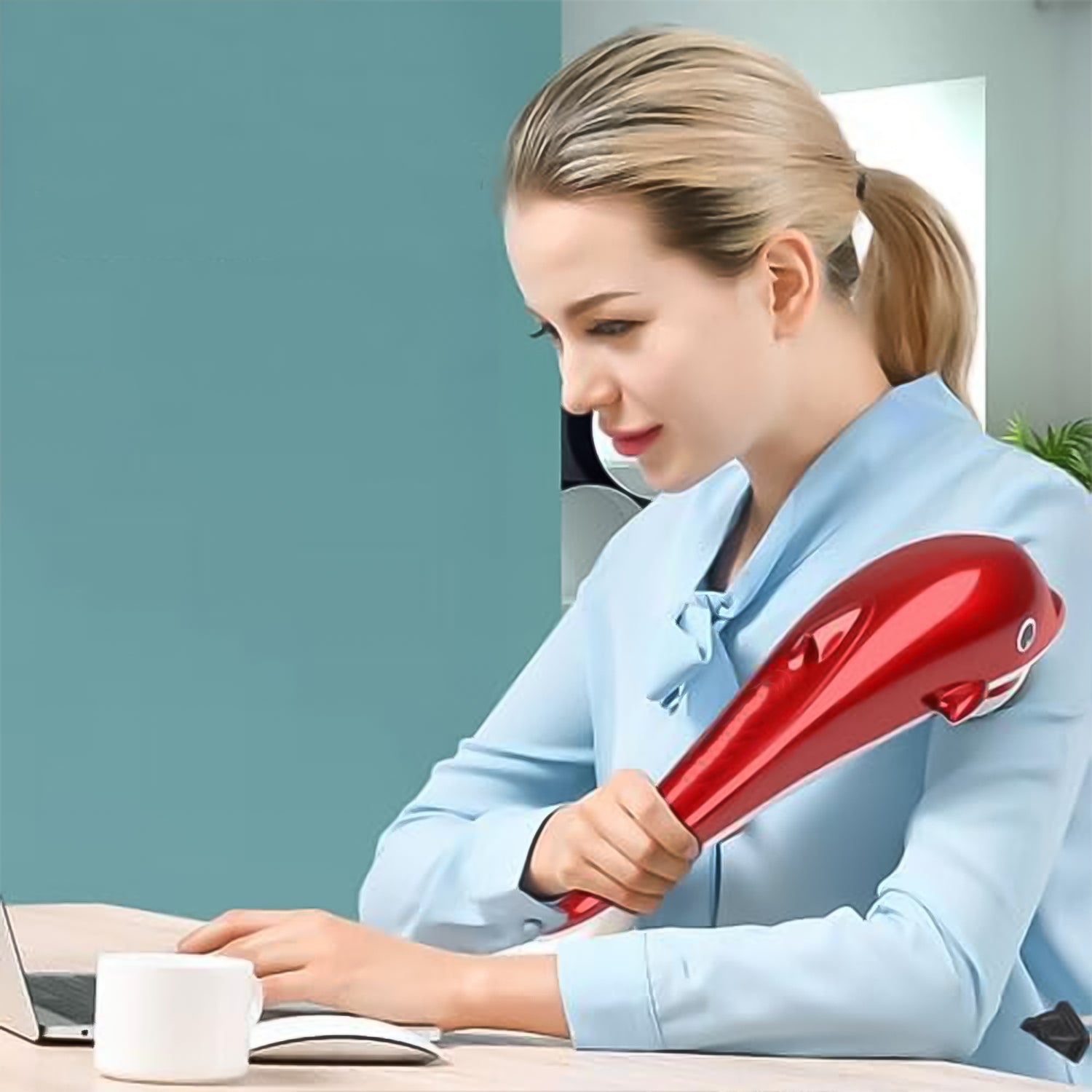 portable electric body massager in red handheld design used by woman at desk for arm and shoulder relief