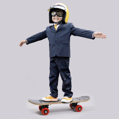 toy image boy in suit and helmet balancing on a wood skateboard for beginners with red wheels