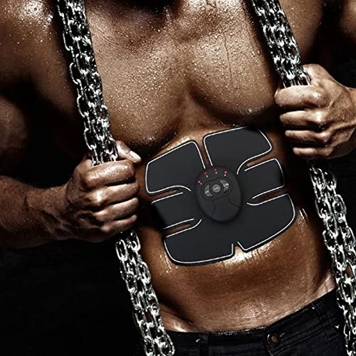 abdominal muscle exerciser device on muscular male torso black pad with control unit