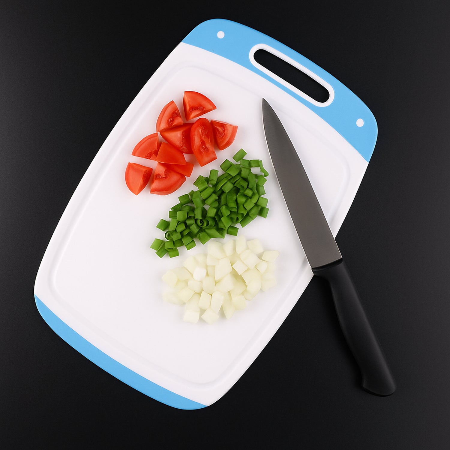white cutting board with blue trim chef knife and diced tomatoes green peppers onions best chopping board for home use
