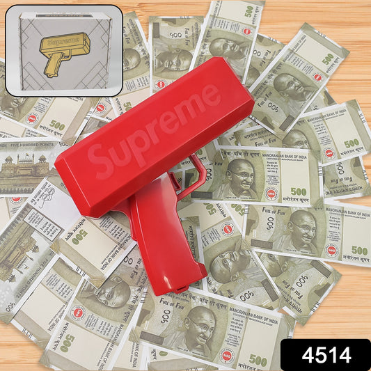 red toy money gun shooter for parties firing fake rupee bills on wooden table model 4514