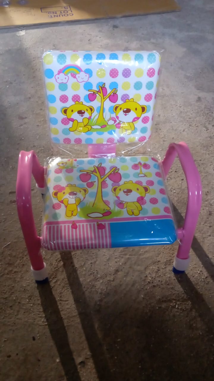 cartoon baby chair with steel frame padded seat and back pink armrests with bear tree print