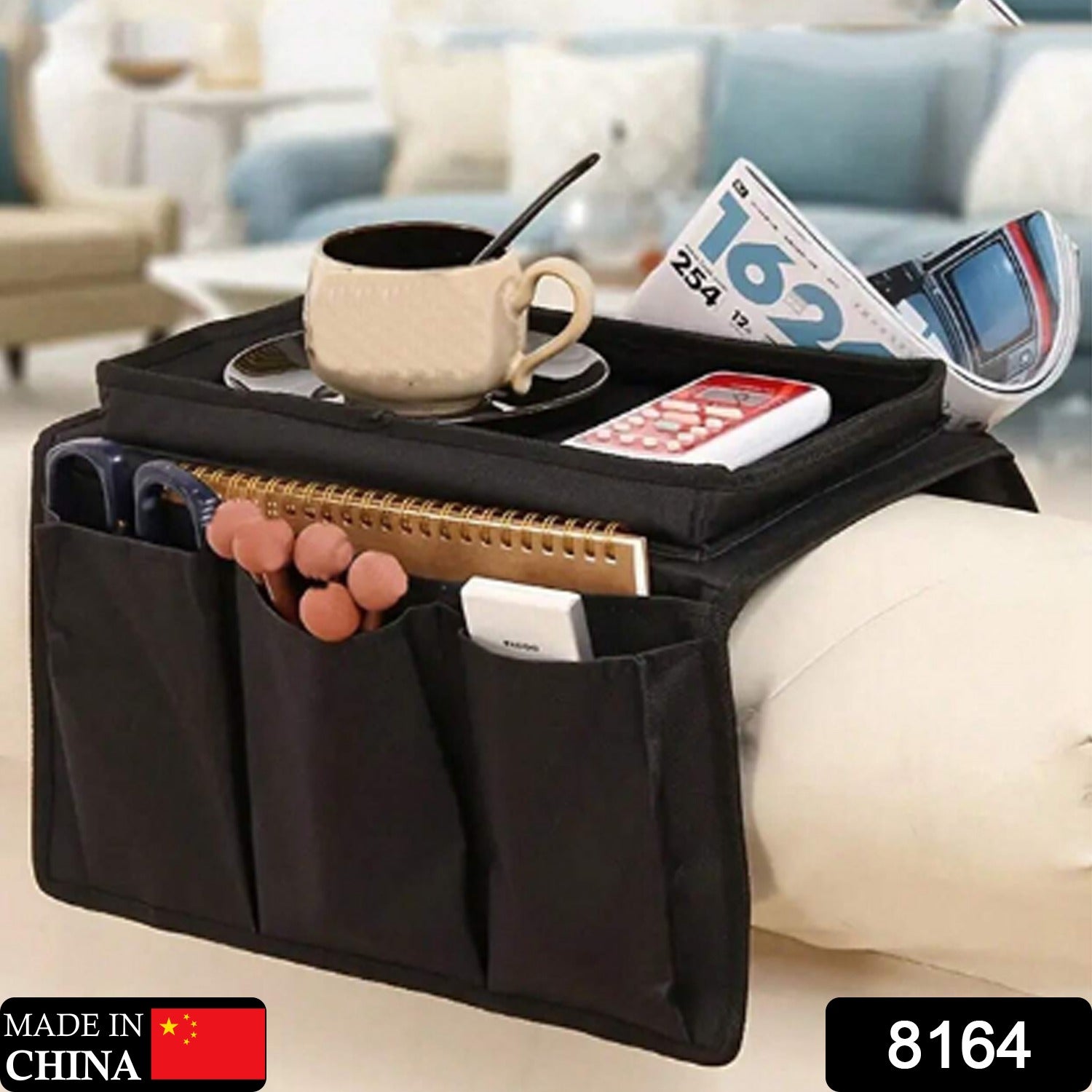 black sofa armrest organizer storage bag with tray cup holder and multiple pockets for remotes phones notebooks