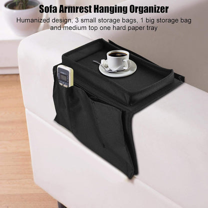 black sofa armrest organizer storage bag with cup tray and side pockets holding remote on white couch