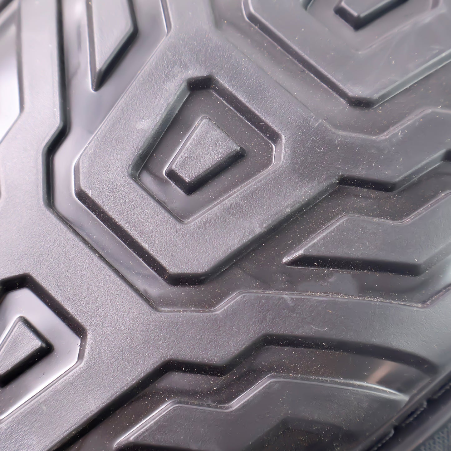 shock-resistant knee pads for construction close up textured black protective shell for impact absorption